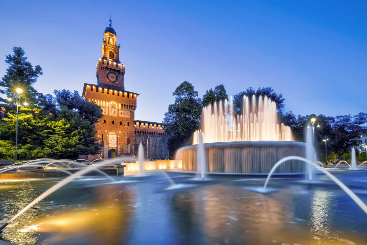 Sforza Castel (Castello Sforzesco) at night in Milan, Italy. This castle was built in the 15th century by Francesco Sforza, Duke of Milan.